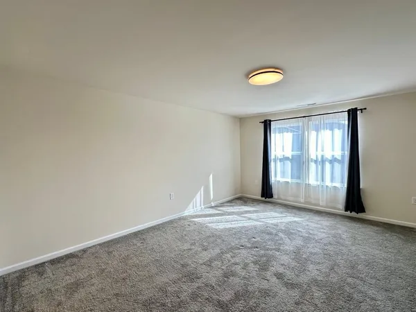 a view of an empty room with window