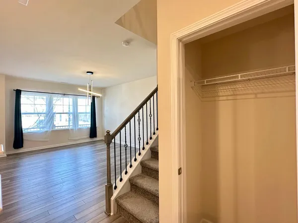 a view of entryway with wooden floor