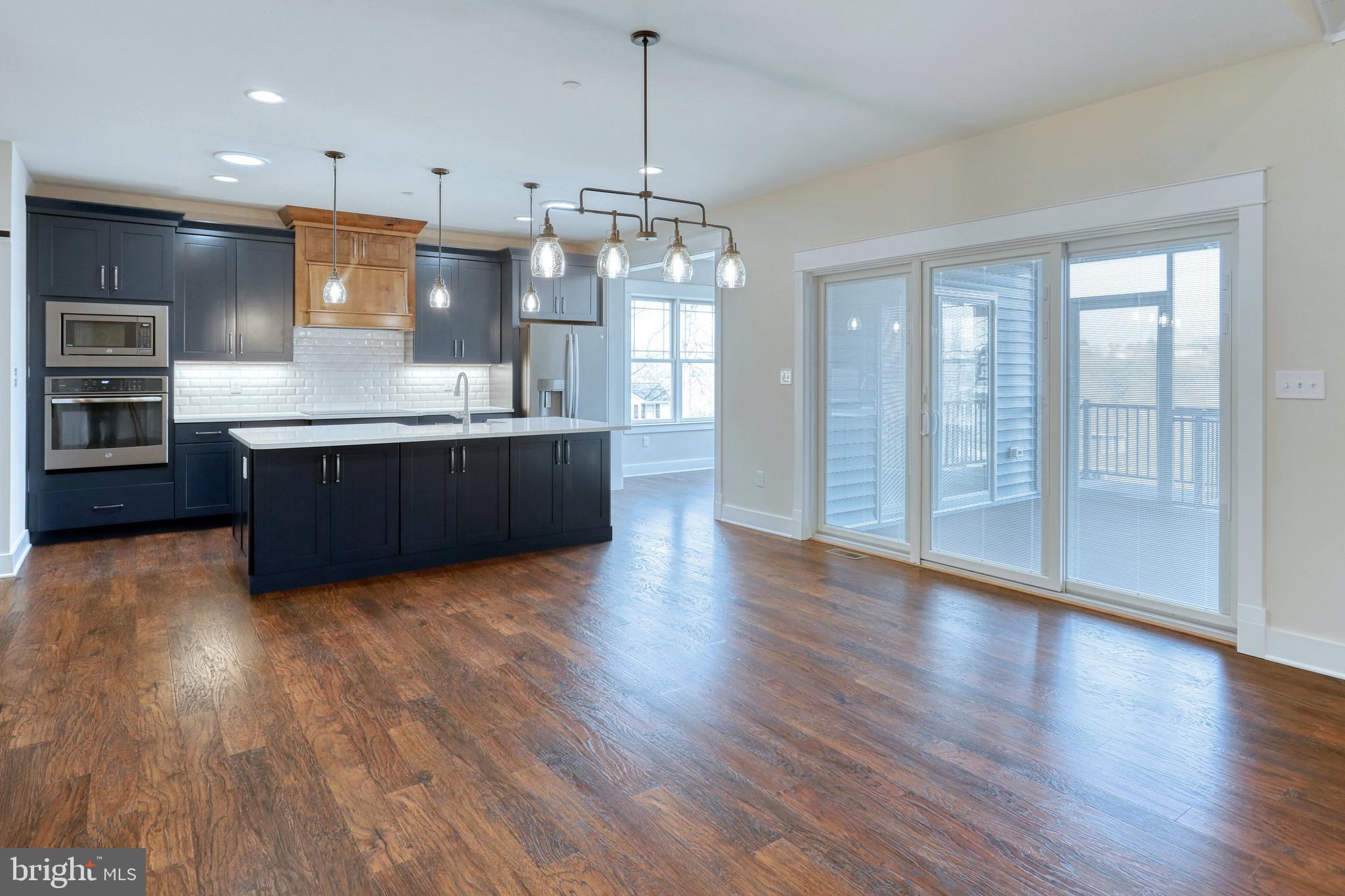 35 Warren Trail Fairfield, PA 17320 - Photo 15 of 67 a view of kitchen with granite countertop cabinets and wooden floor