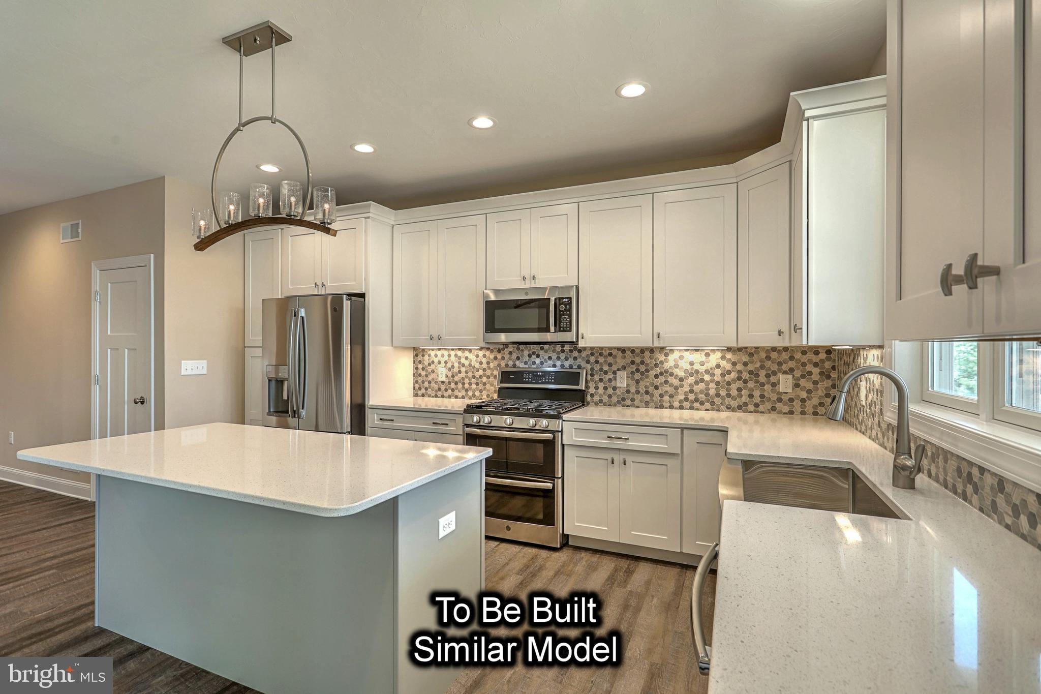 35 Warren Trail Fairfield, PA 17320 - Photo 17 of 67 a kitchen with a sink stainless steel appliances and white cabinets