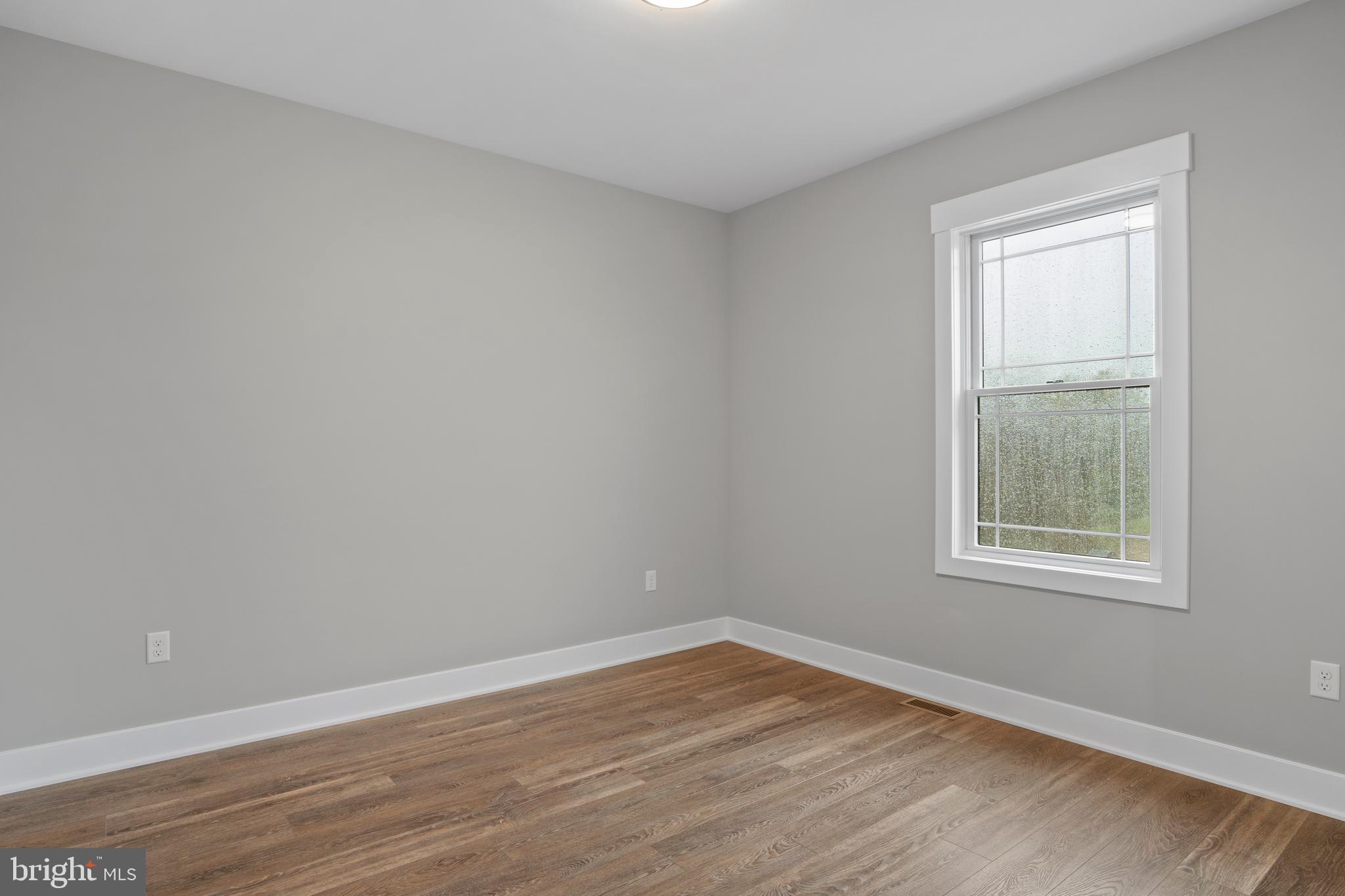 35 Warren Trail Fairfield, PA 17320 - Photo 40 of 67 a view of an empty room with wooden floor and a window