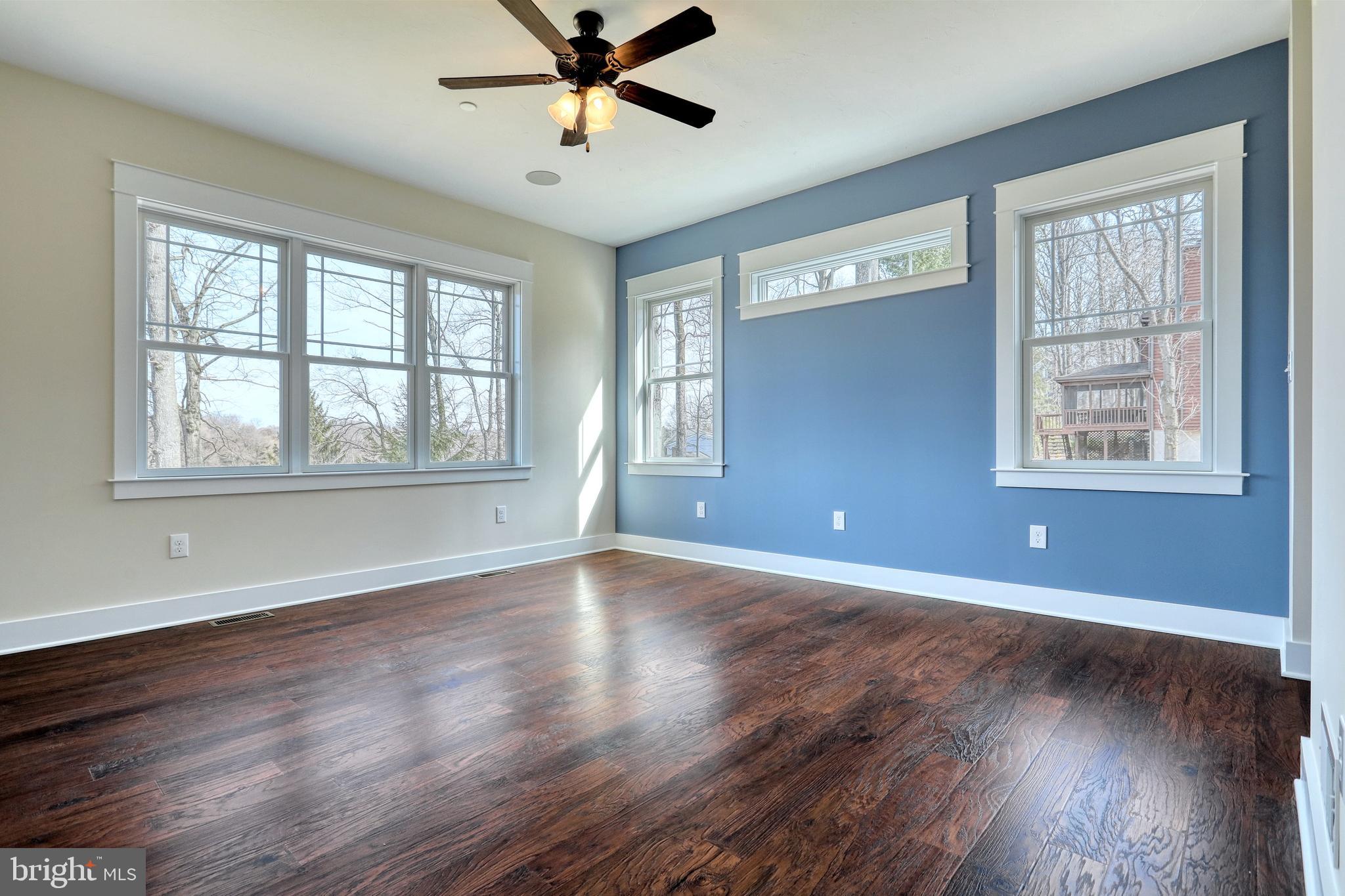 35 Warren Trail Fairfield, PA 17320 - Photo 42 of 67 a view of an empty room with wooden floor and a window