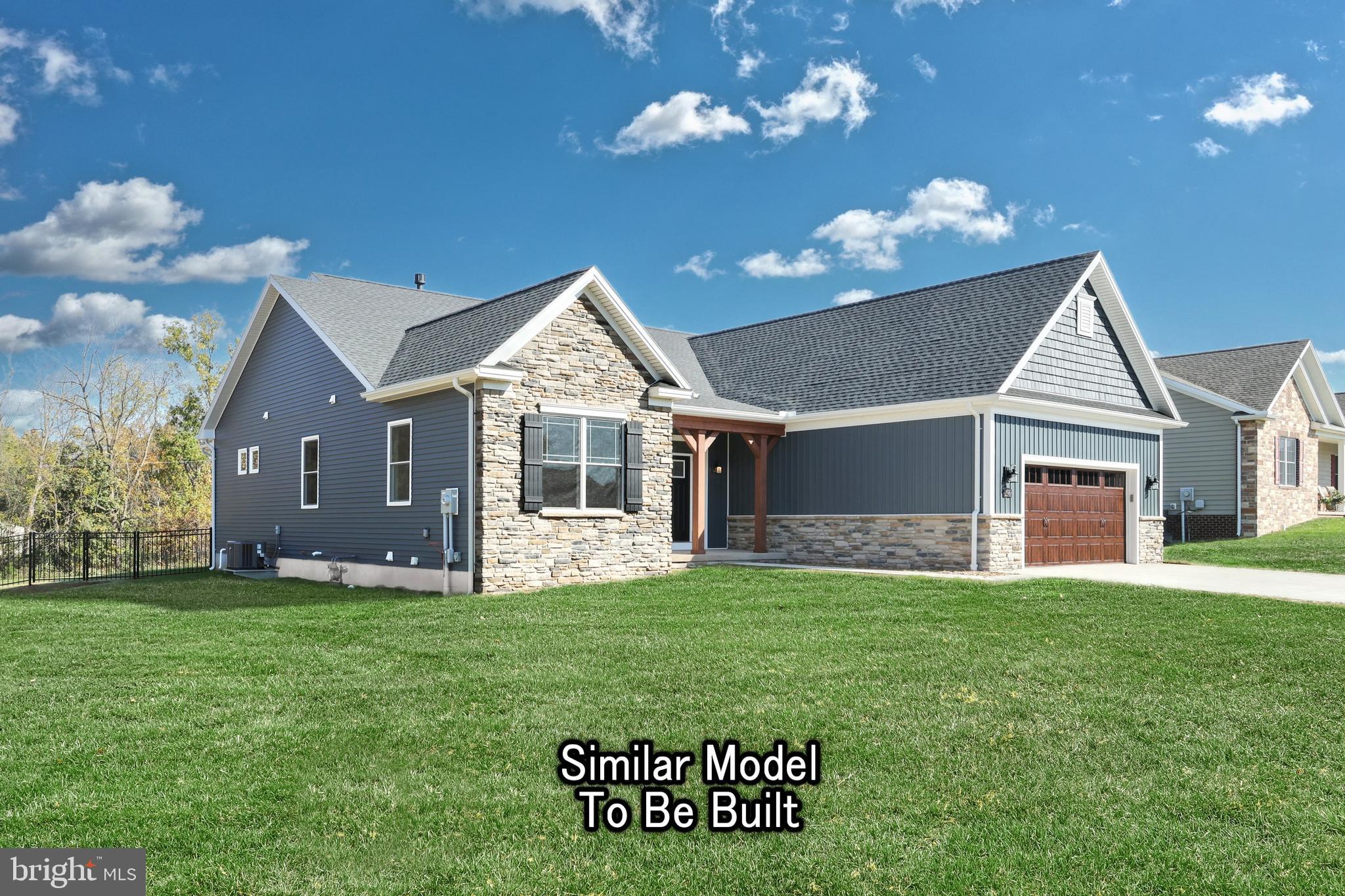 35 Warren Trail Fairfield, PA 17320 - Photo 5 of 67 a view of a house with a yard and a porch
