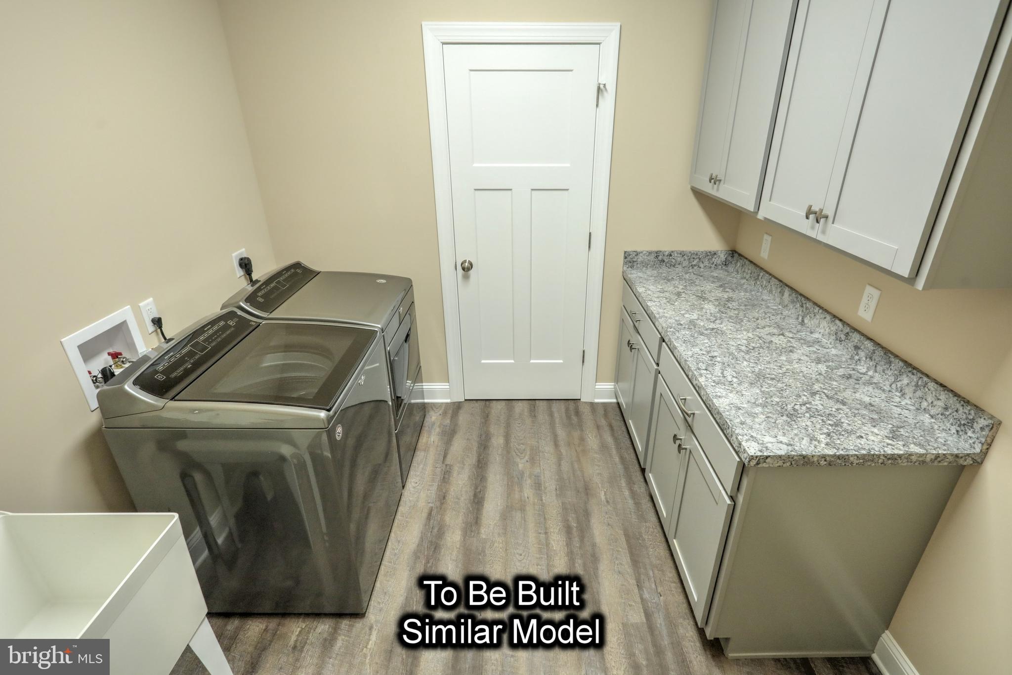 35 Warren Trail Fairfield, PA 17320 - Photo 65 of 67 a utility room with a sink washer and dryer