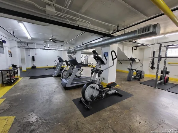 a view of a room with gym equipment