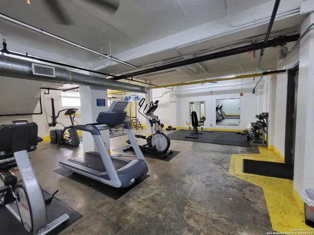 a view of yard with swimming pool and bench