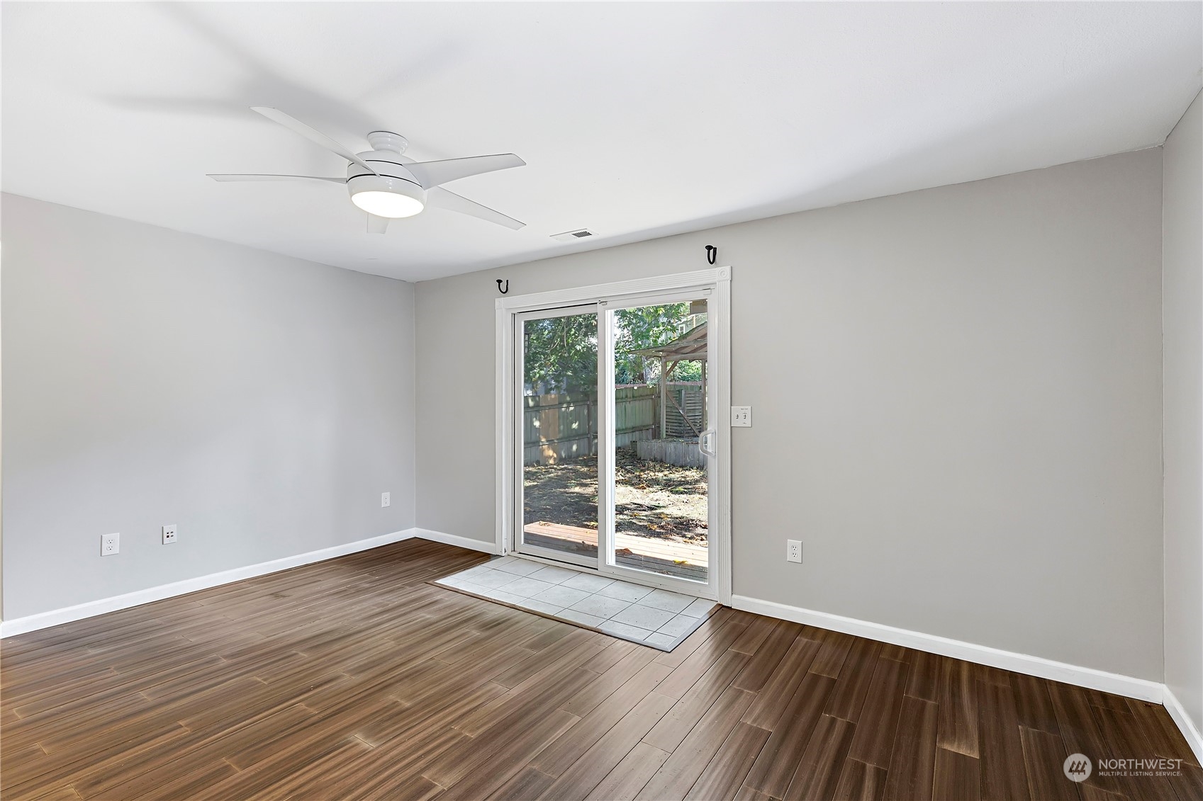 7209 6th Avenue West Everett, WA 98203 - Photo 14 of 27 wooden floor in an empty room with a window