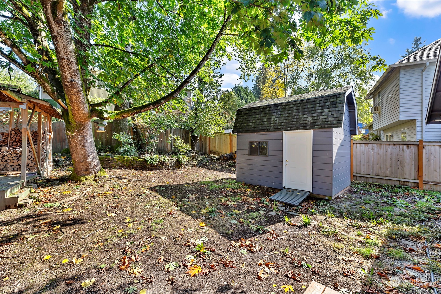 7209 6th Avenue West Everett, WA 98203 - Photo 27 of 27 a view of a house with a yard and tree s
