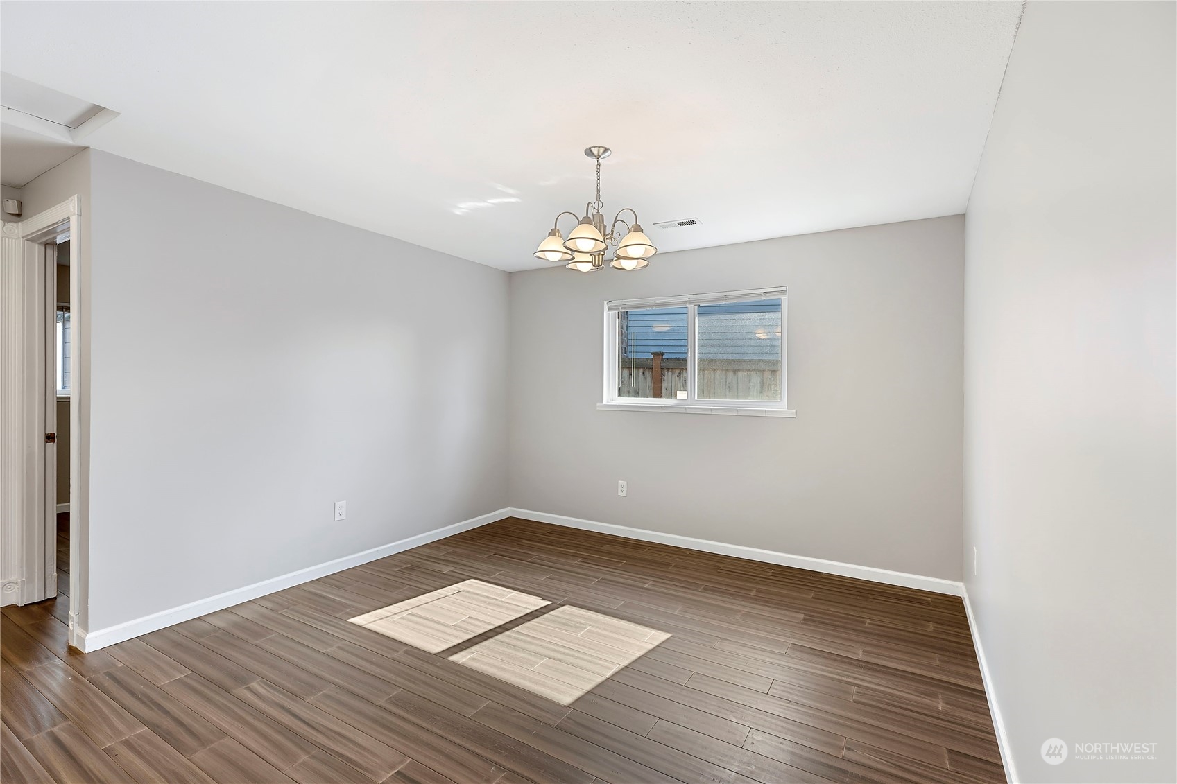7209 6th Avenue West Everett, WA 98203 - Photo 9 of 27 a very nice looking room with wooden floor and a ceiling fan