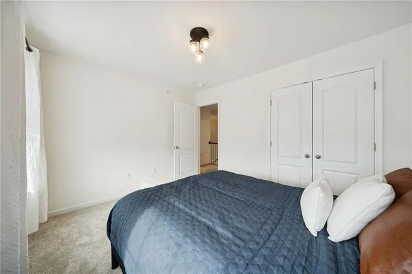 a view of a livingroom with wooden floor