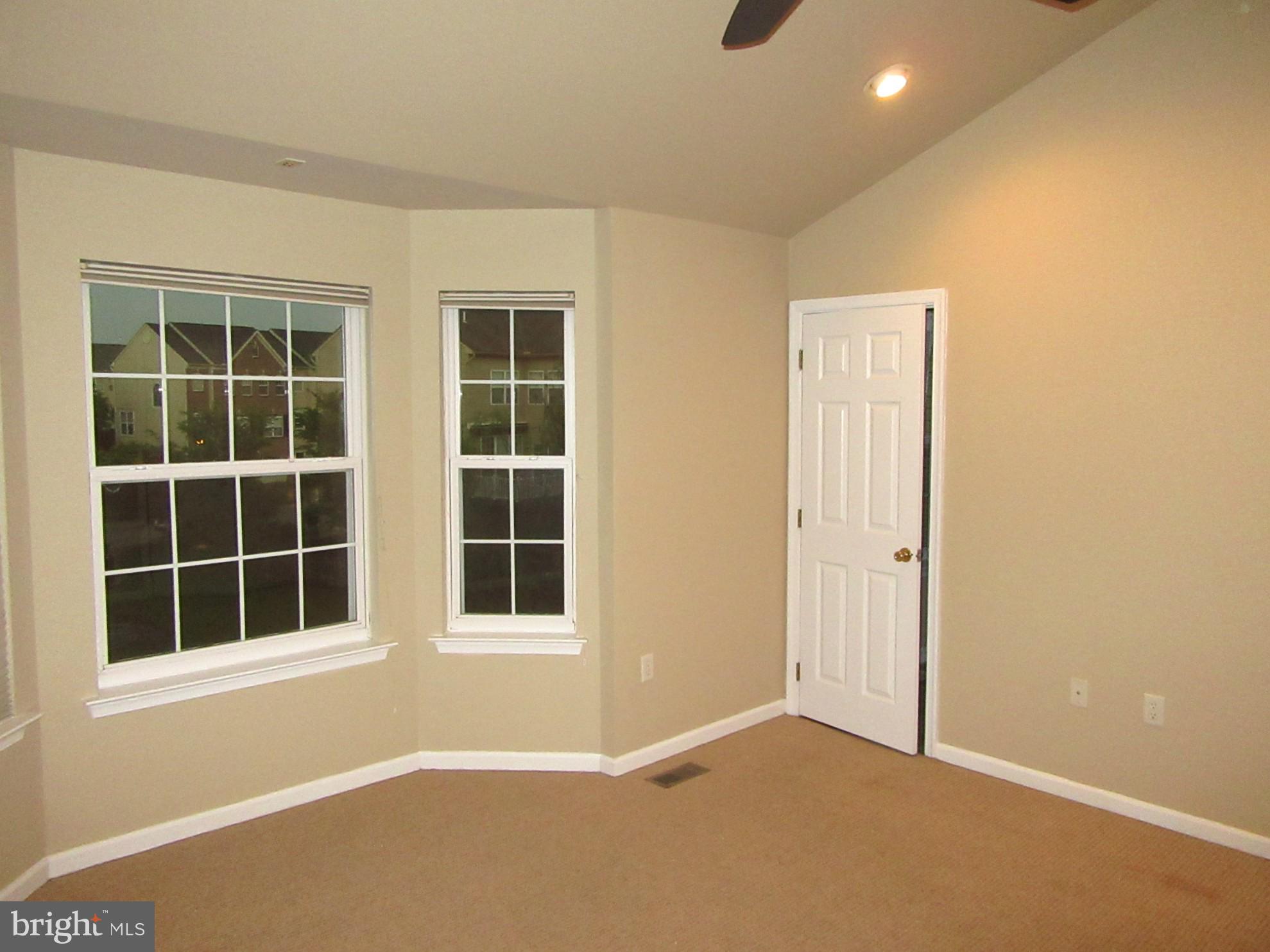 103 Persimmon Place Bear, DE 19701 - Photo 14 of 22 a view of empty room with windows