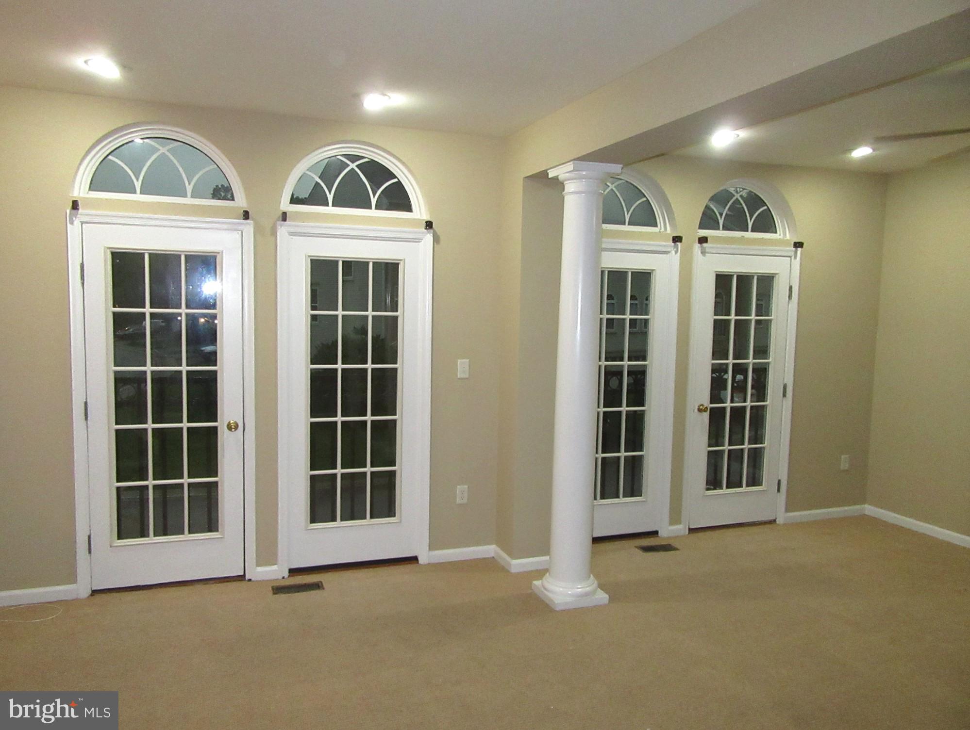 103 Persimmon Place Bear, DE 19701 - Photo 10 of 22 a view of an apartment with many windows