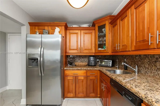 a bedroom with a bed and a cabinets