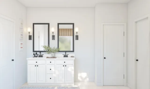 a bathroom with a double vanity sink mirror and