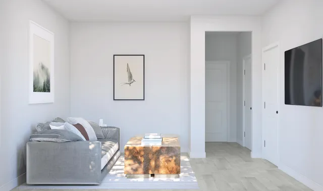 a living room with furniture and window