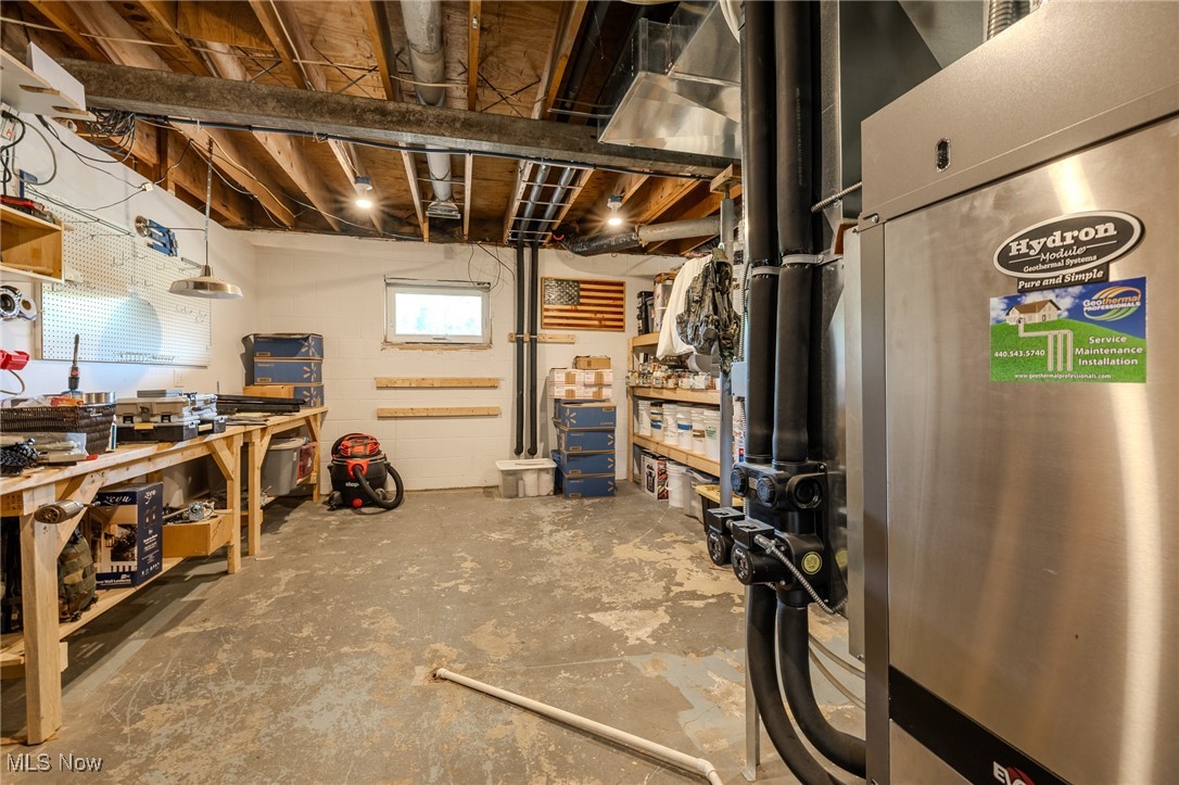 6268 Summers Road Windsor, OH 44099 - Photo 46 of 49 Below grade area featuring a workshop area