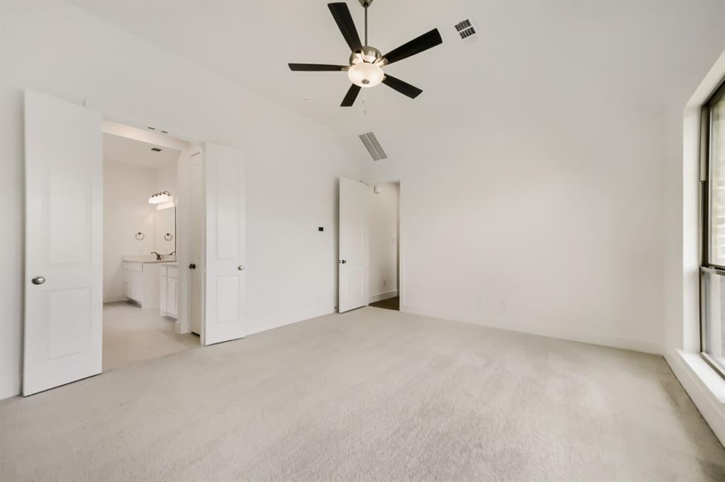 11465 Wulstone Road Fort Worth, TX 76052 - Photo 14 of 27 Spacious room featuring light-colored carpeting and a modern ceiling fan with integrated lighting