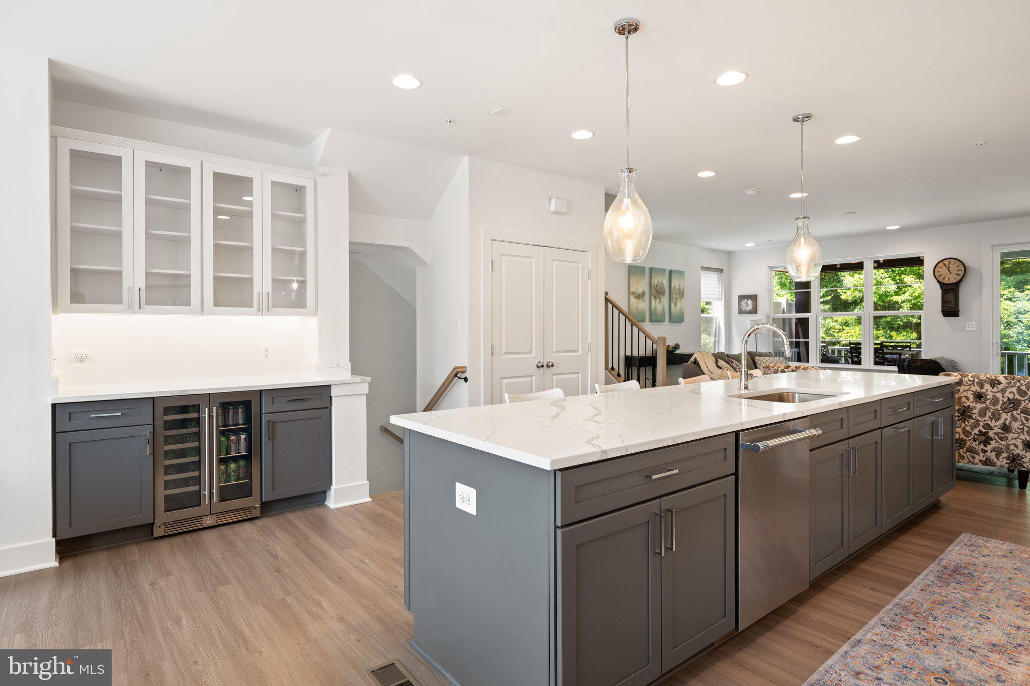 302 Alluvium Drive Laurel, MD 20724 - Photo 4 of 66 a bathroom with a sink double vanity granite and a large mirror