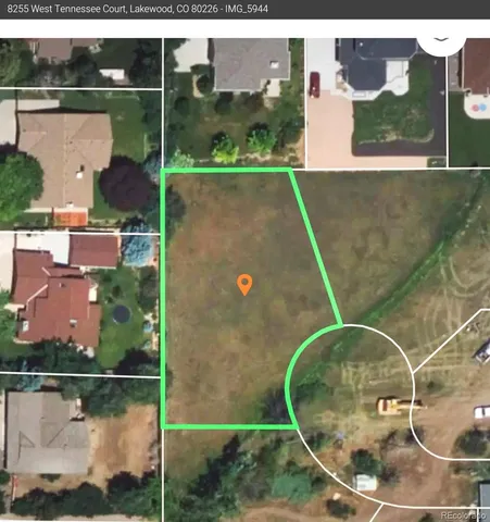 a view of a street with a building in the background