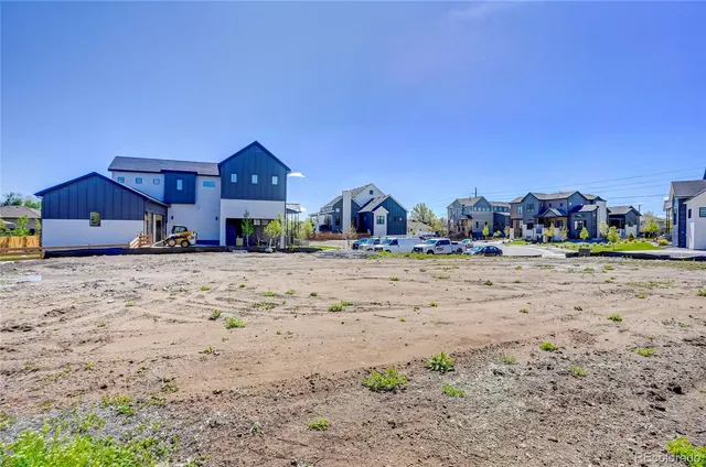 a view of a road with a building in the background
