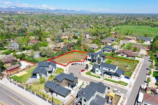 an aerial view of residential house with outdoor space and river view