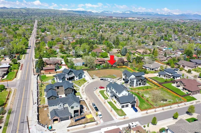 an aerial view of a house with a garden