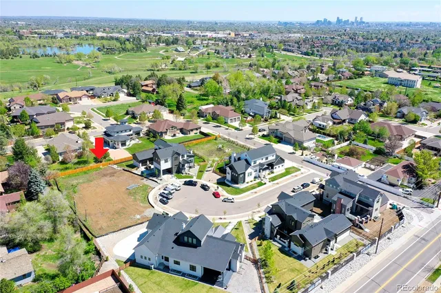 an aerial view of a city with lots of residential buildings