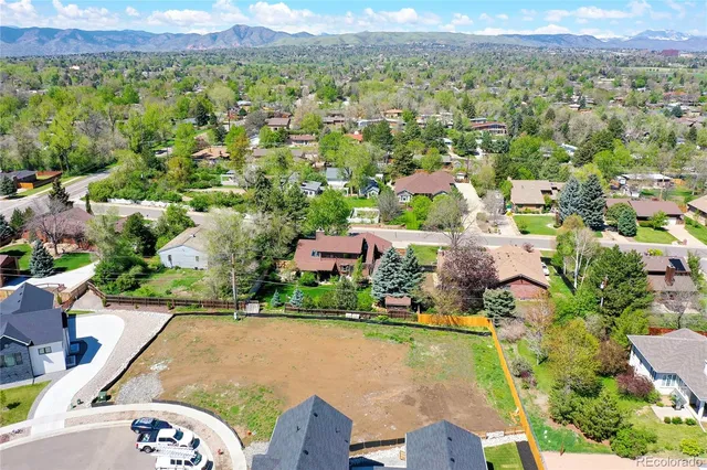 an aerial view of a house with a garden