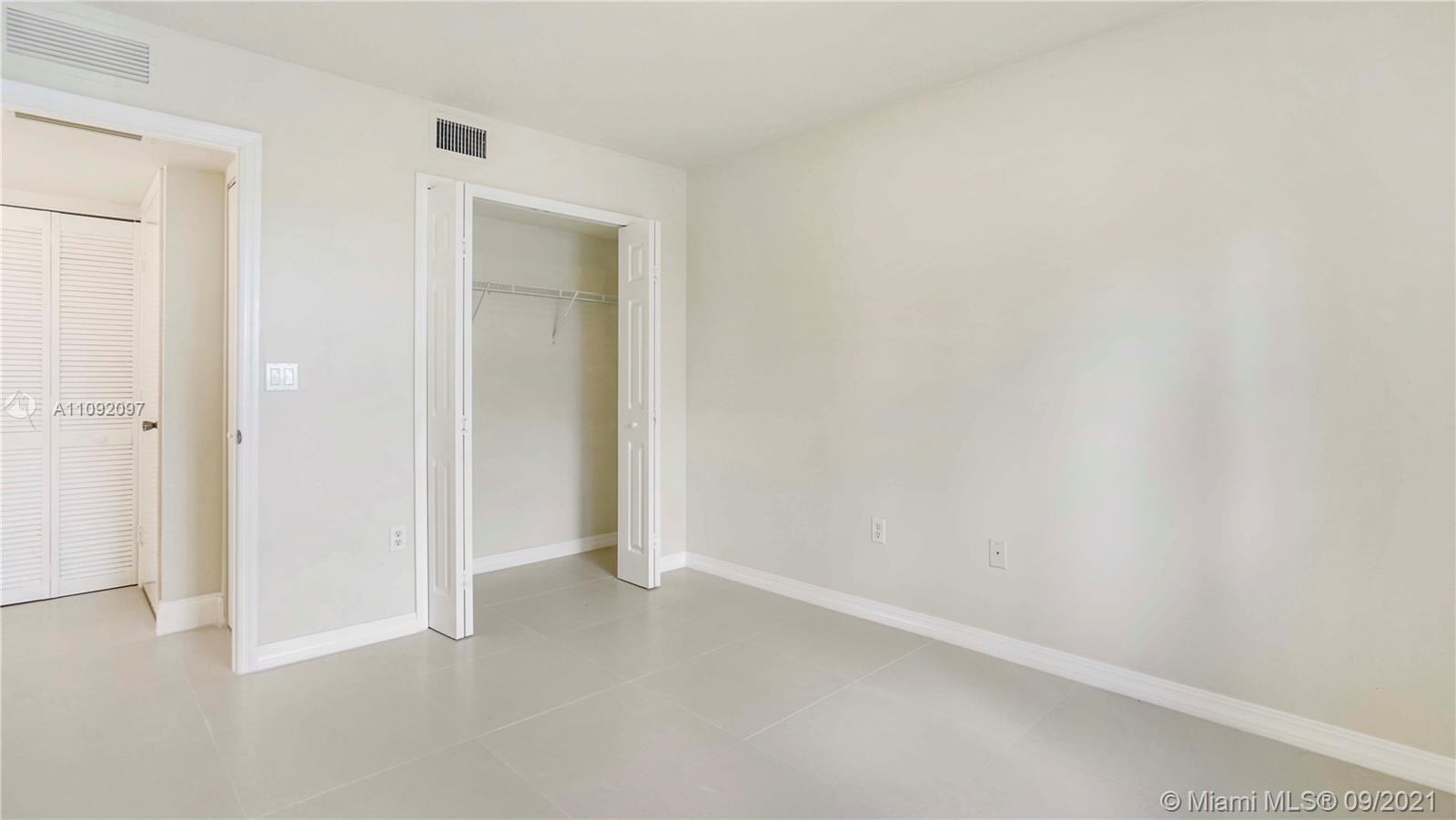 1270 Southeast 26th Street, Unit 101 Homestead, FL 33035 - Photo 6 of 12 a view of an empty room