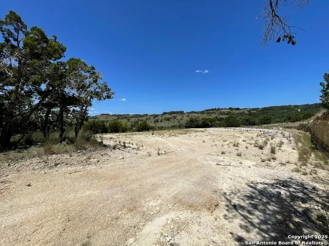 a view of lake with green space