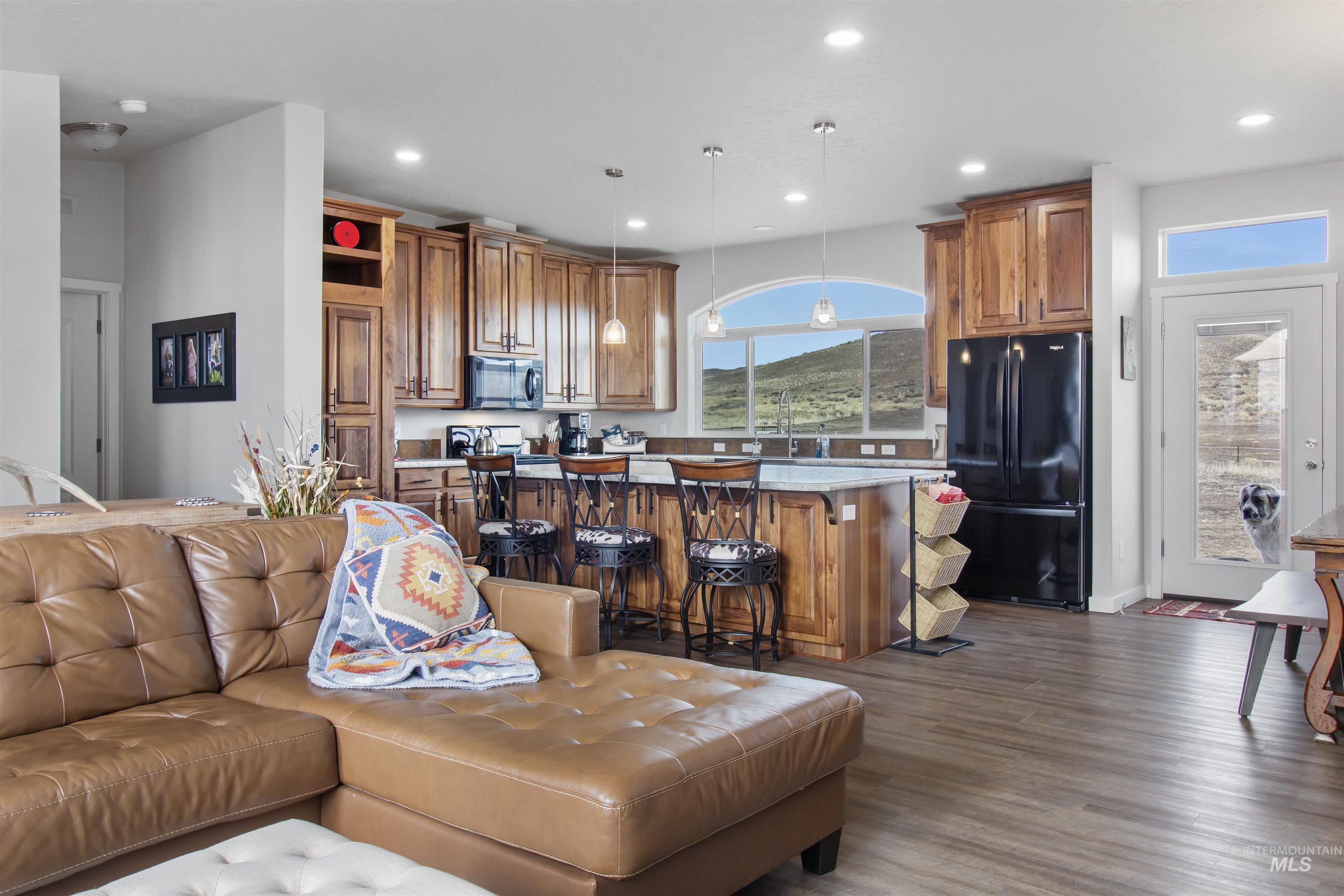161 Horseshoe Loop West Fairfield, ID 83327 - Photo 25 of 50 Living area featuring dark wood-style floors and recessed lighting