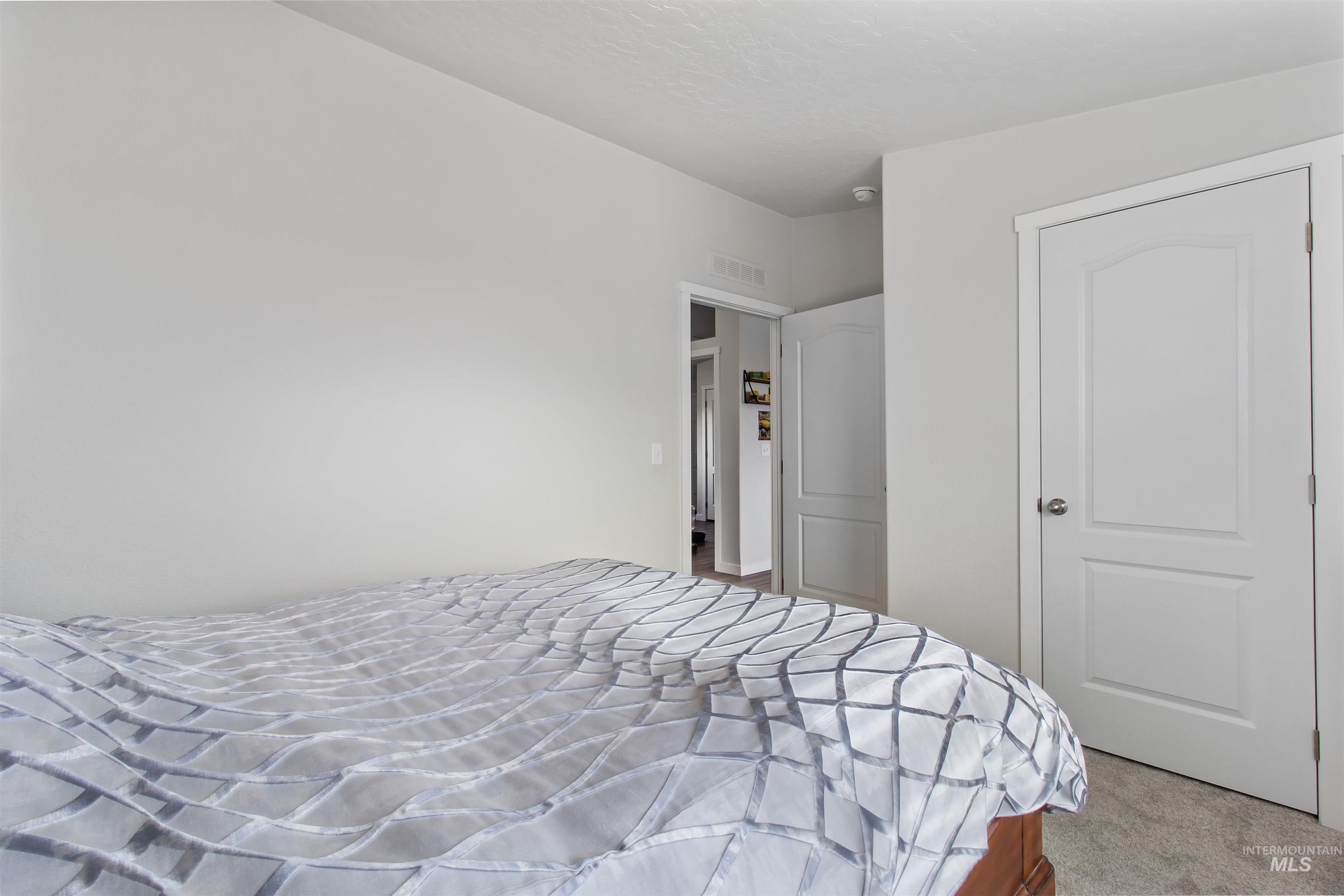 161 Horseshoe Loop West Fairfield, ID 83327 - Photo 38 of 50 Bedroom with carpet flooring