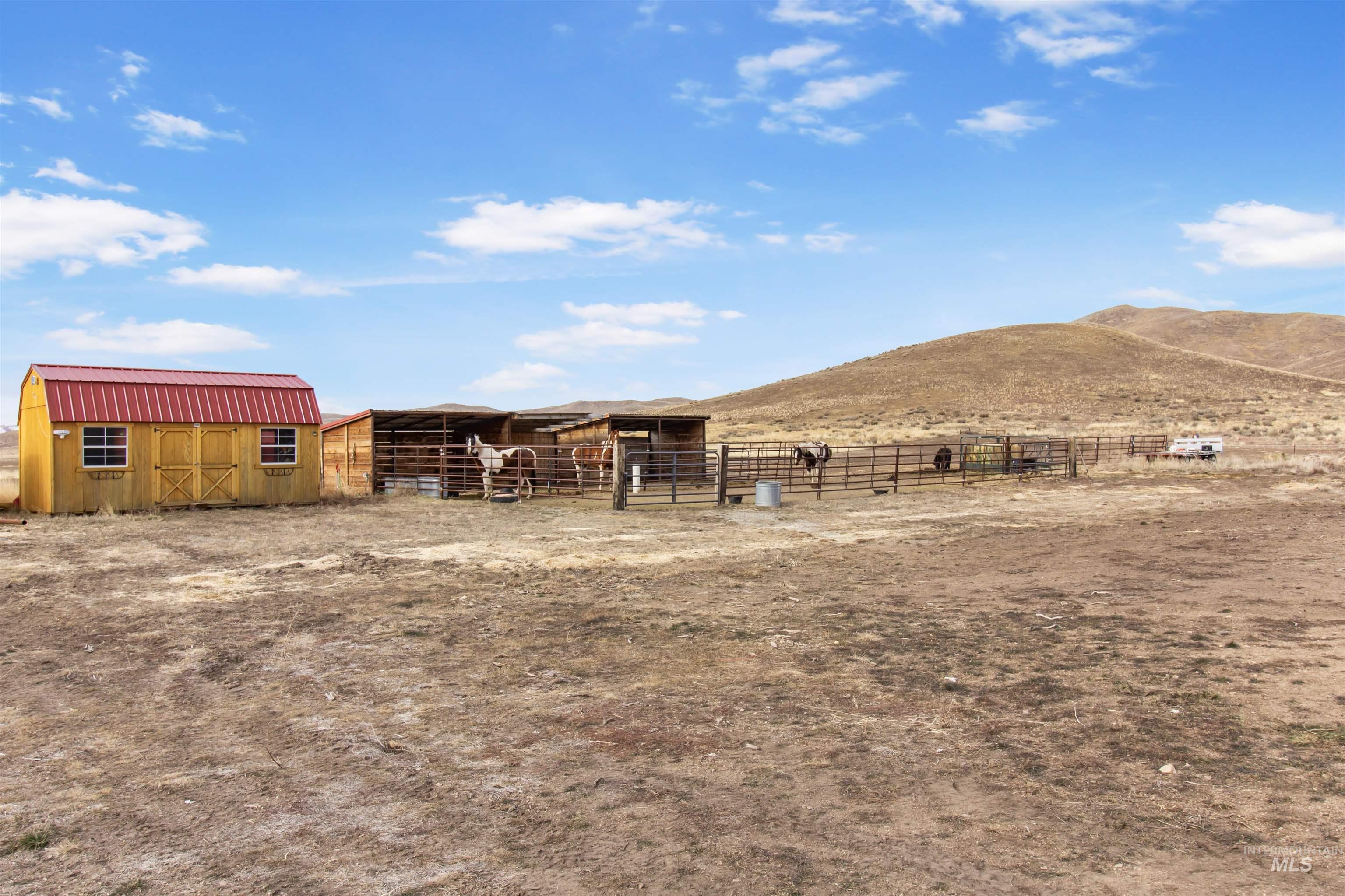 161 Horseshoe Loop West Fairfield, ID 83327 - Photo 43 of 50 Stable featuring a mountain view and a rural view