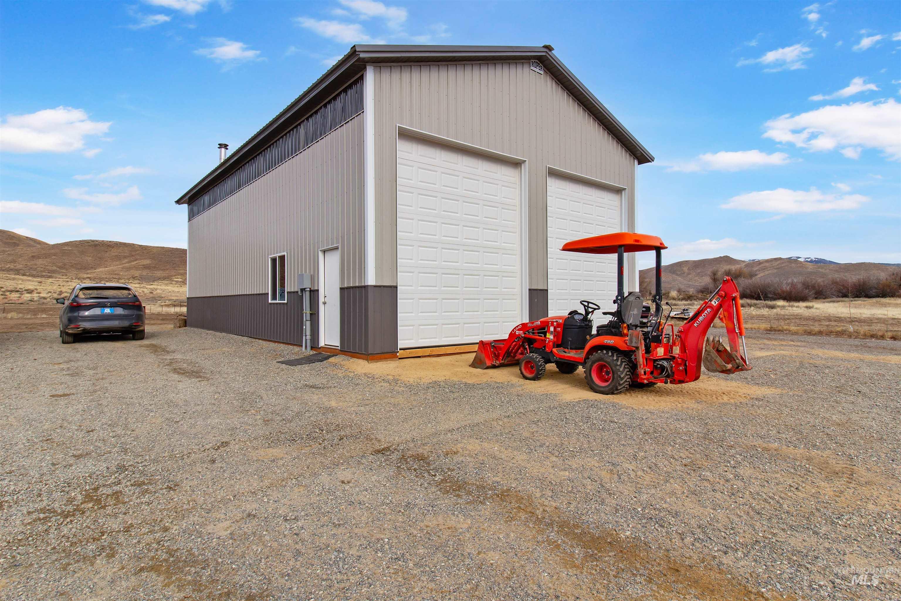 161 Horseshoe Loop West Fairfield, ID 83327 - Photo 45 of 50 Detached garage featuring a mountain view