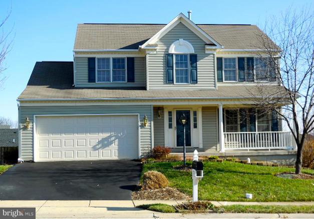 1751 Canal Run Drive Point of Rocks, MD 21777 - Photo 1 of 23 a front view of a house with a yard