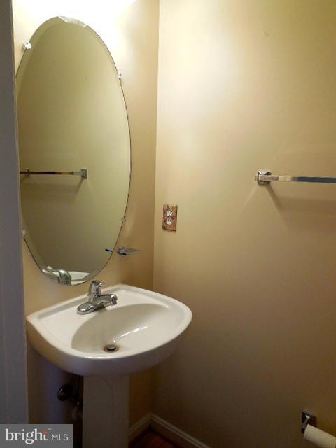 1751 Canal Run Drive Point of Rocks, MD 21777 - Photo 12 of 23 a bathroom with a sink and mirror