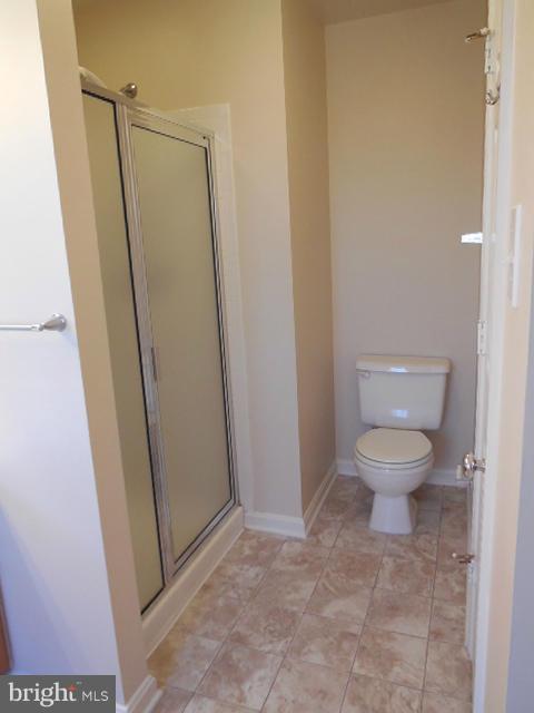 1751 Canal Run Drive Point of Rocks, MD 21777 - Photo 19 of 23 a bathroom with a toilet and a shower