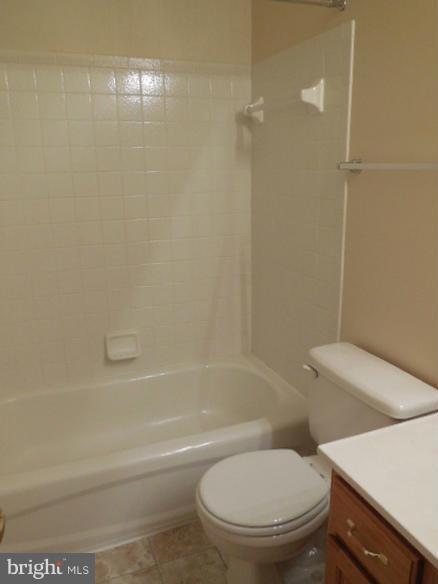 1751 Canal Run Drive Point of Rocks, MD 21777 - Photo 20 of 23 a white toilet and tub sitting next to a bathroom sink