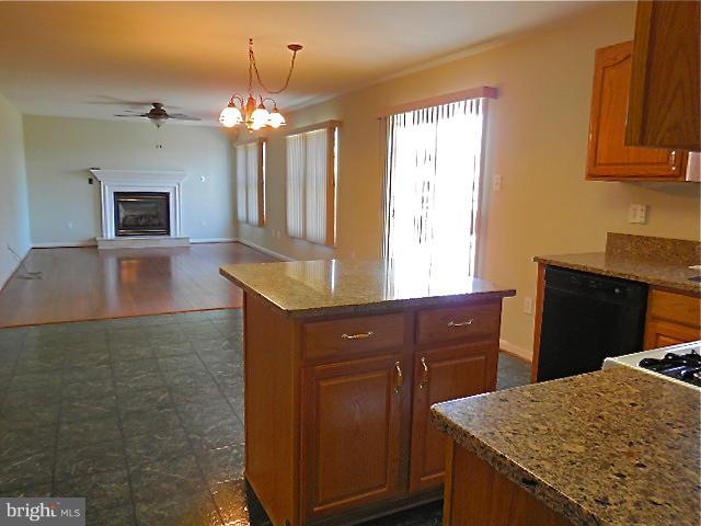 1751 Canal Run Drive Point of Rocks, MD 21777 - Photo 6 of 23 a kitchen with a wooden cabinets and dishwasher