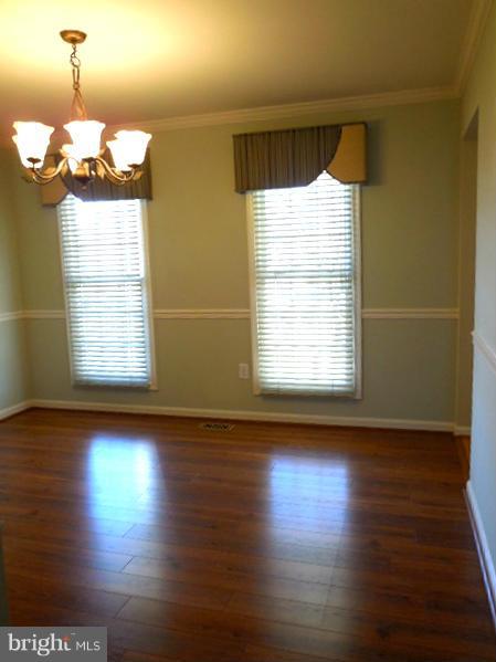 1751 Canal Run Drive Point of Rocks, MD 21777 - Photo 10 of 23 a view of empty room with wooden floor and fan