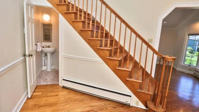 a kitchen with stainless steel appliances granite countertop a stove and a sink