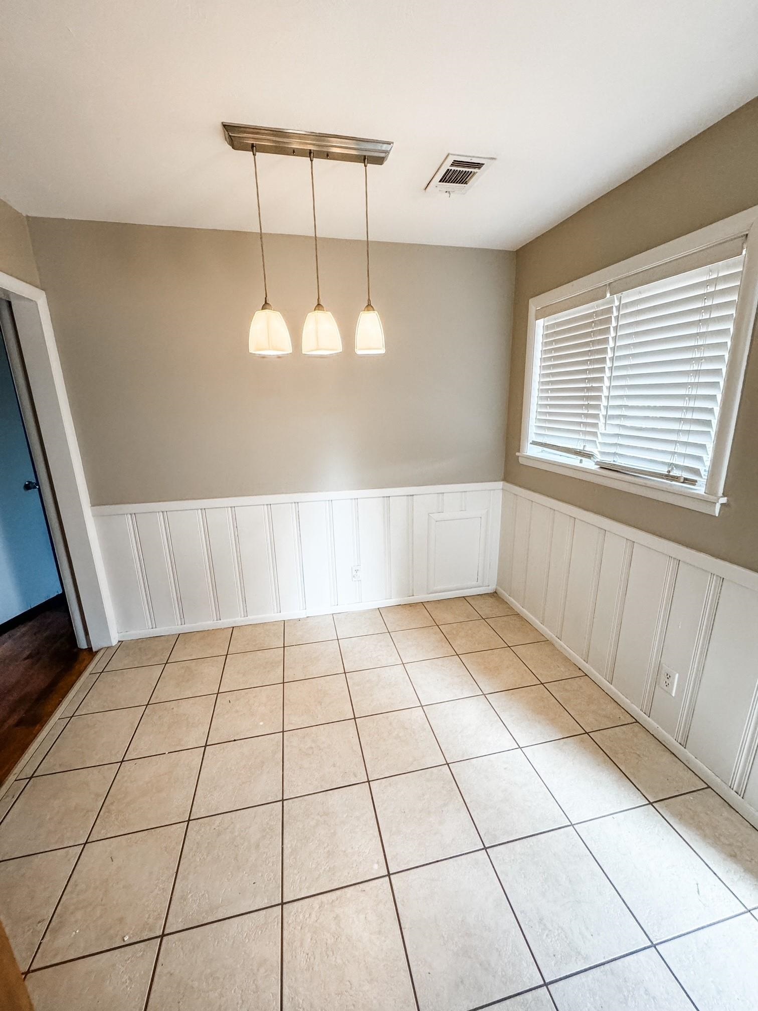 296 North Yates Road Memphis, TN 38120 - Photo 3 of 7 a view of an empty room and window