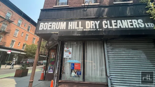 a view of a building with a street in the house