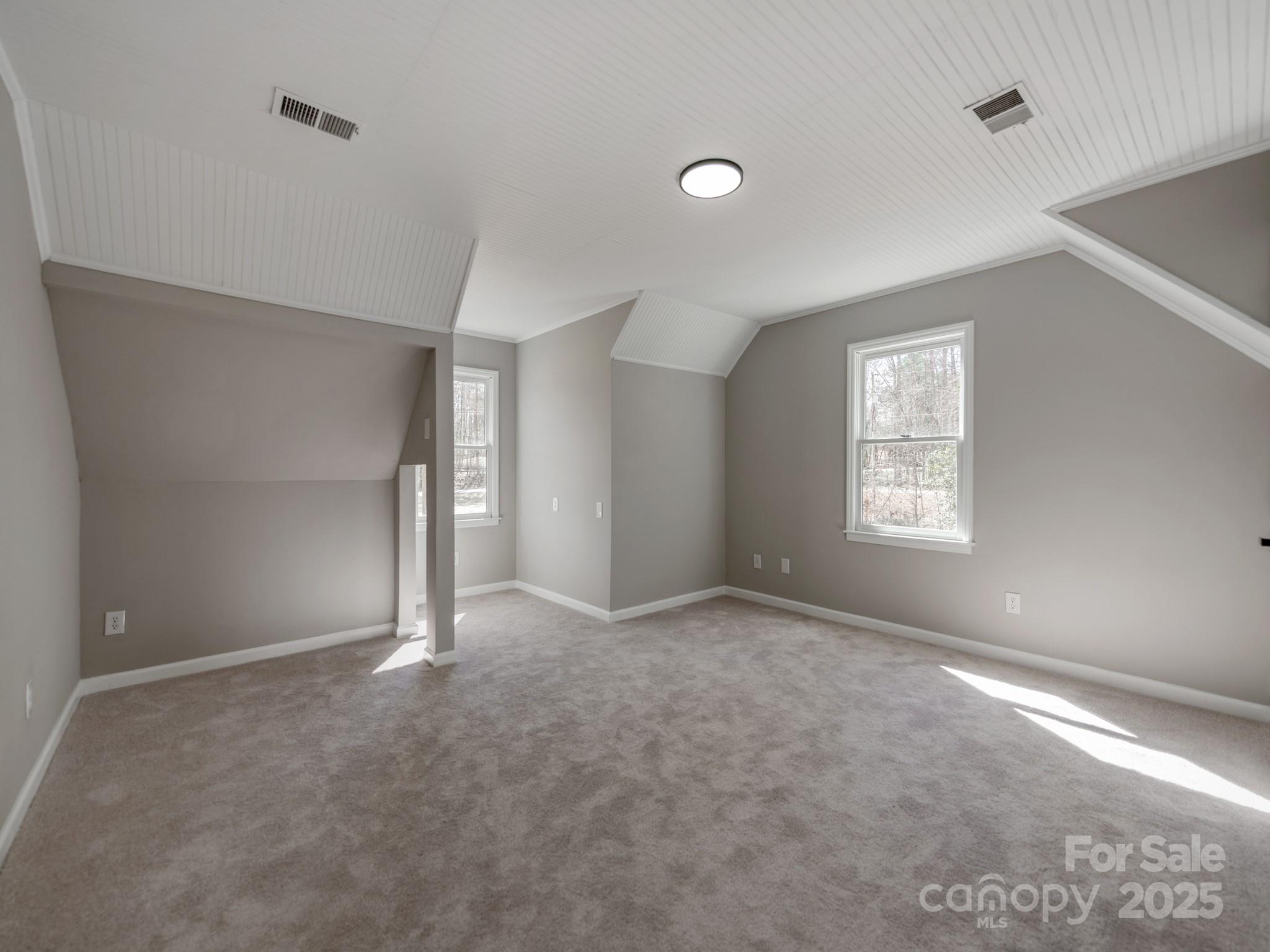 107 Rutledge Road Mount Holly, NC 28120 - Photo 18 of 26 an empty room with windows and closet