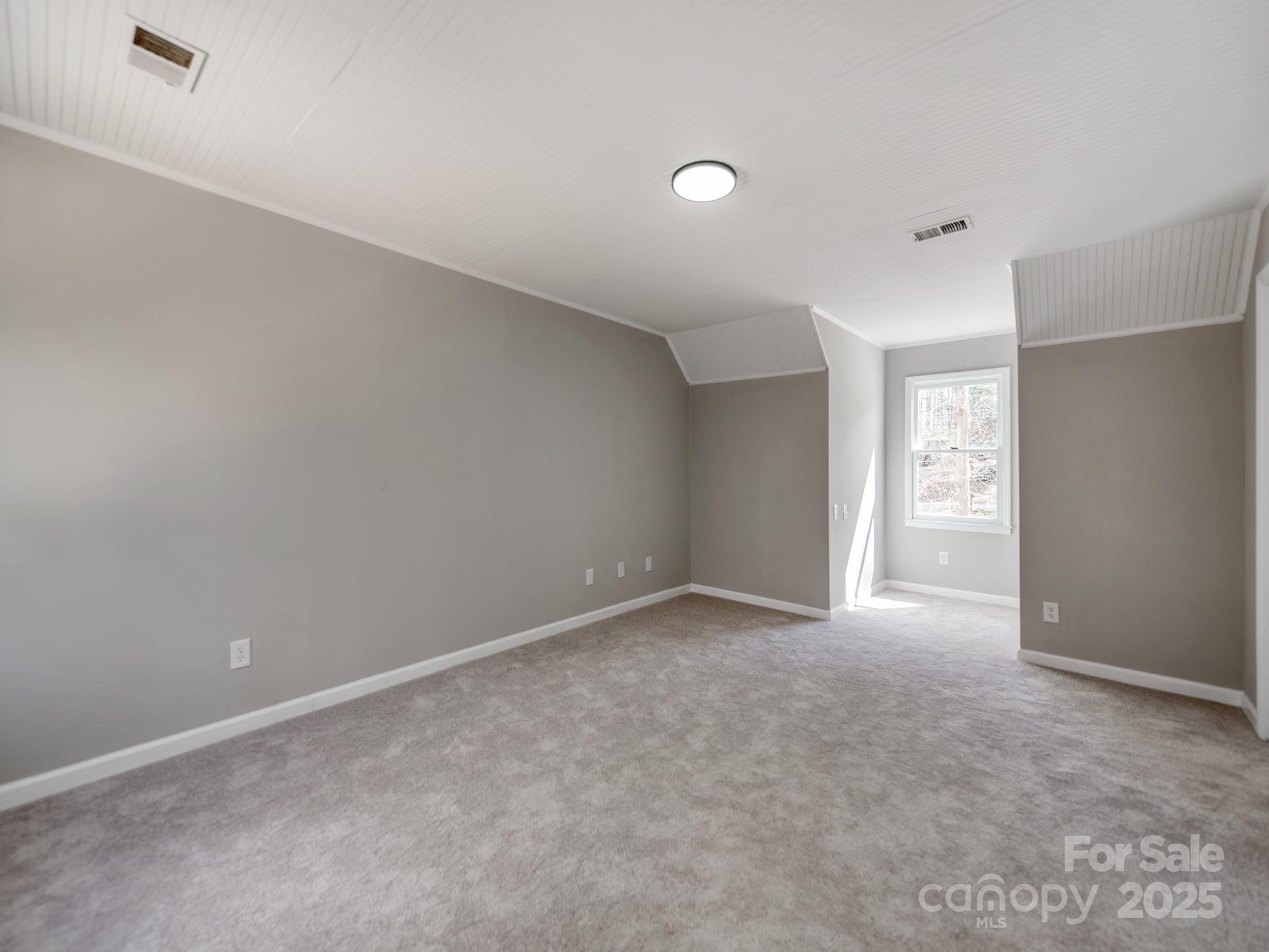 107 Rutledge Road Mount Holly, NC 28120 - Photo 21 of 26 a view of an empty room with a window