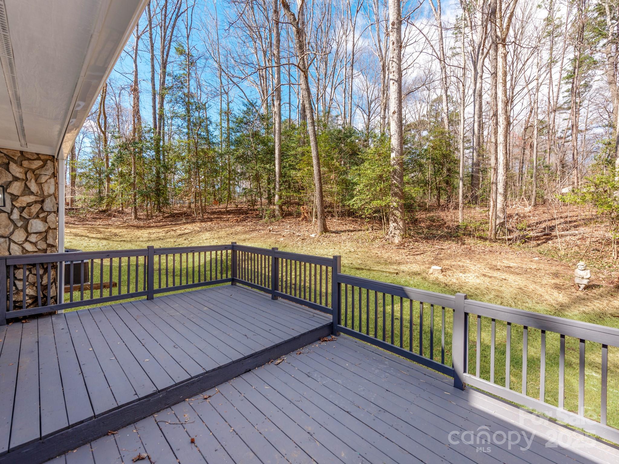 107 Rutledge Road Mount Holly, NC 28120 - Photo 25 of 26 a view of a wooden deck with a yard