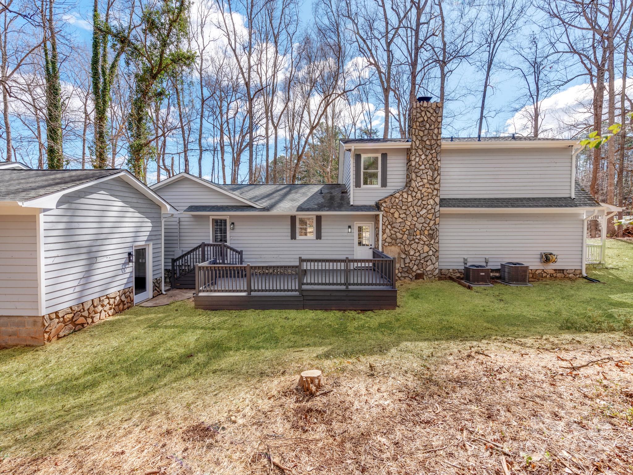 107 Rutledge Road Mount Holly, NC 28120 - Photo 26 of 26 a view of a house with a yard and sitting area