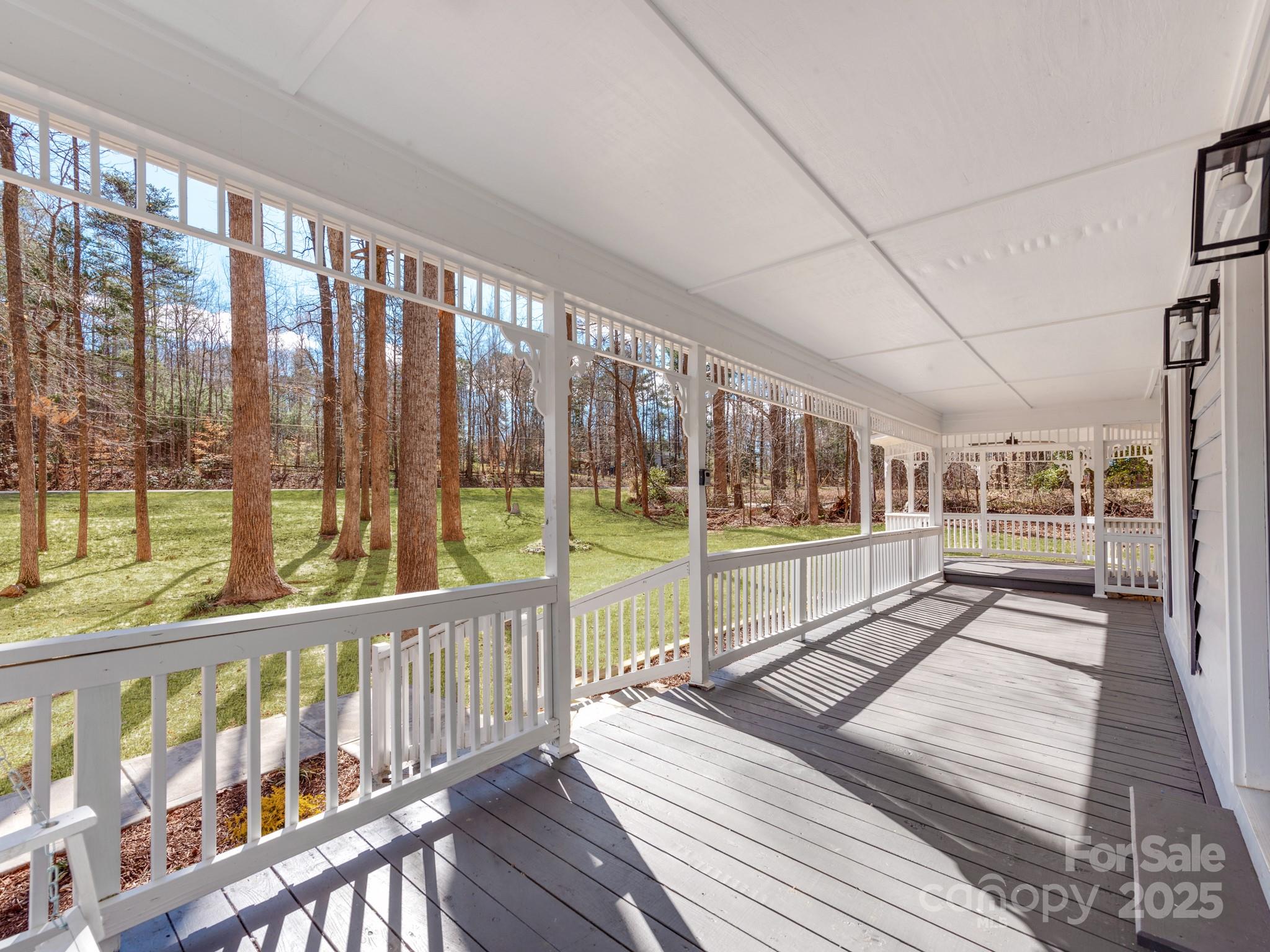 107 Rutledge Road Mount Holly, NC 28120 - Photo 4 of 26 a view of a balcony with wooden floor