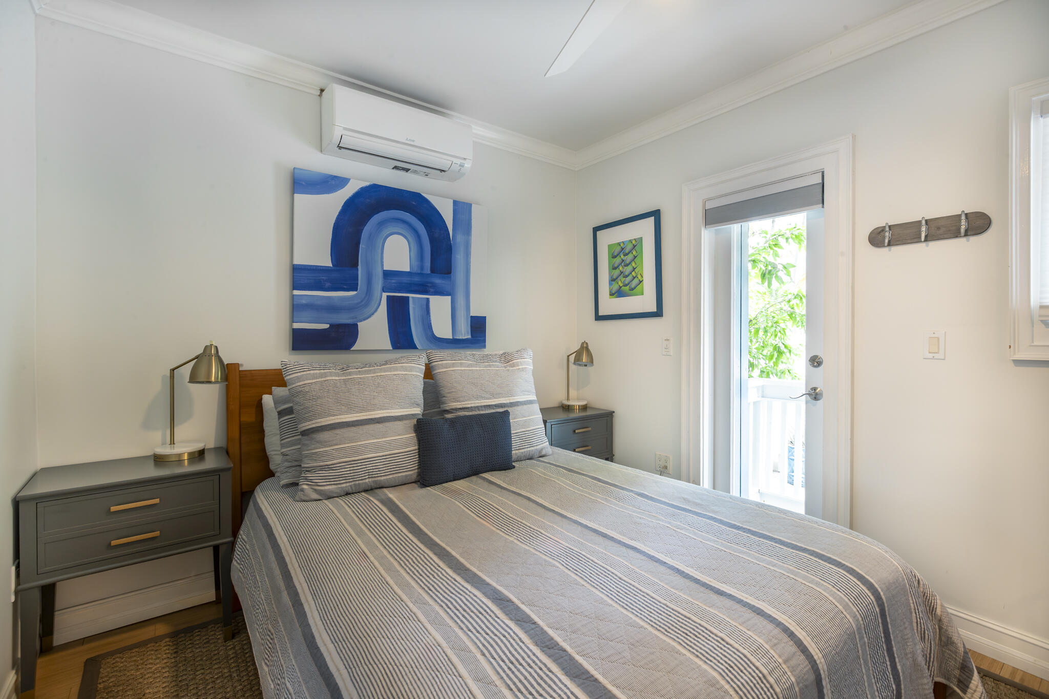 815 Pearl Street, Unit 2 Key West, FL 33040 - Photo 11 of 27 a bedroom with a bed and a window