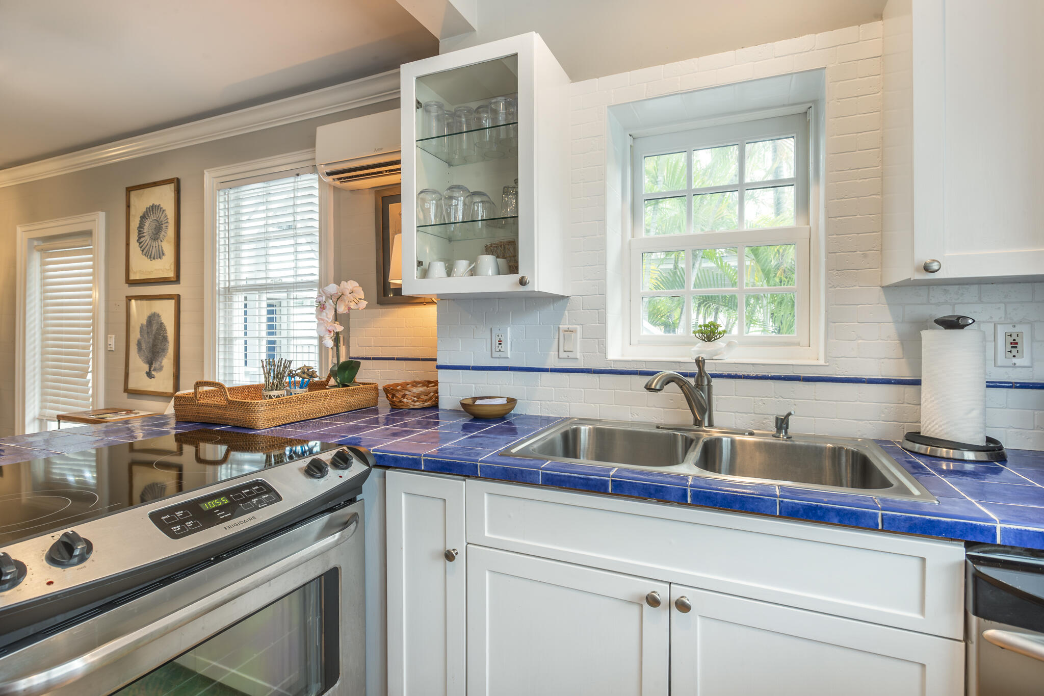 815 Pearl Street, Unit 2 Key West, FL 33040 - Photo 13 of 27 a kitchen with a stove and a sink